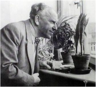 Friedrich Adler by a window